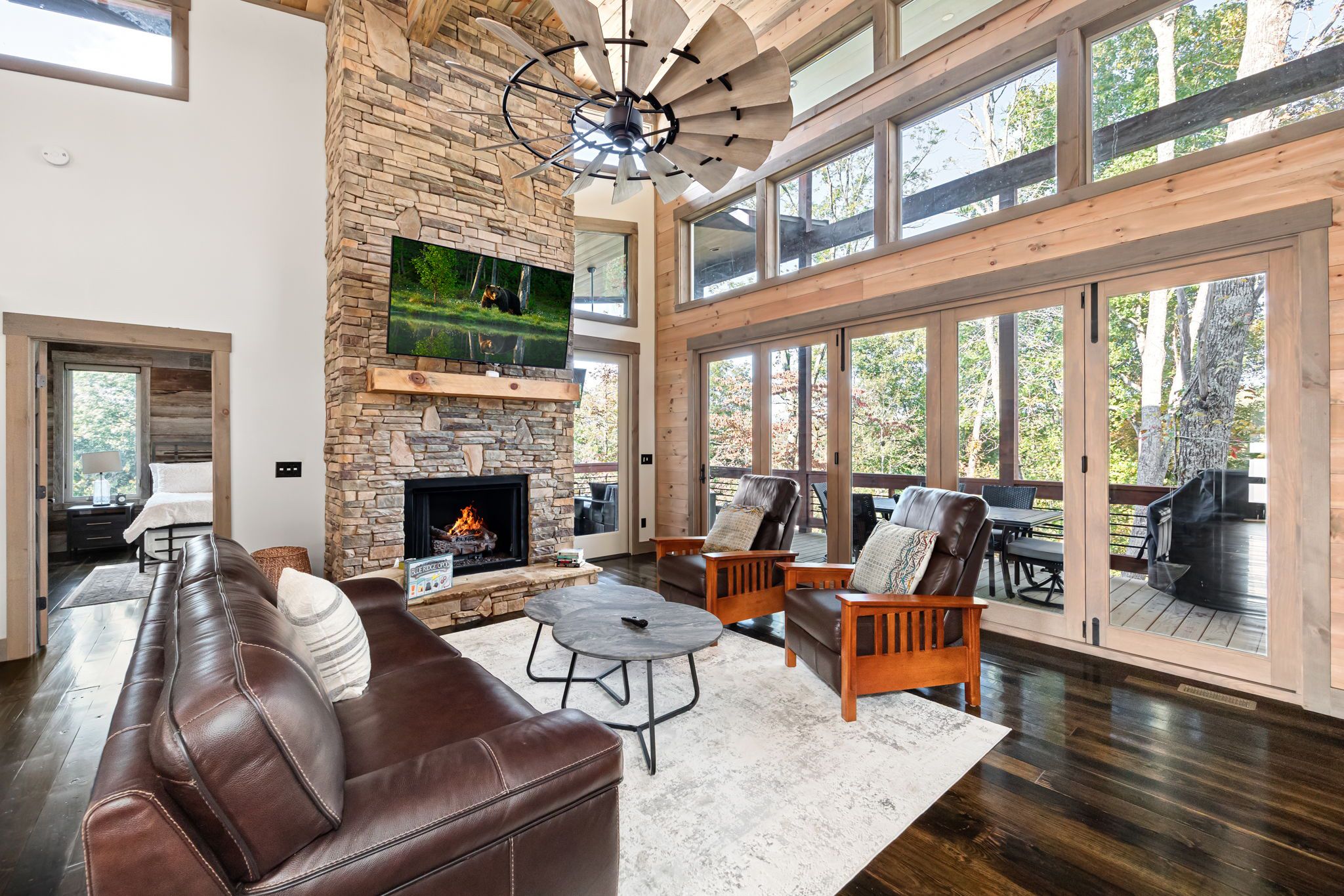 Spacious great room with stone fireplace